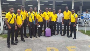 Guyana Jaguars team pose for a photo with GCB Secretary, Anand Sanasie (3rd from left) at the Ogle International Airport.