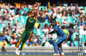 Imran Tahir takes a catch off his own bowling to dismiss Lahiru Thirimanne , South Africa v Sri Lanka, World Cup 2015, 1st quarter-final, Sydney, March 18, 2015 ©ICC