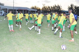 The Golden Jaguars doing some warm up exercises at the GDF ground in January ahead of the Barbados friendly.  