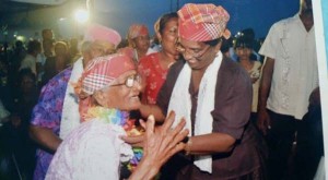 Spreading Phagwah cheer recently to East Canje’s oldest resident, 103-year-old Ellen Benny