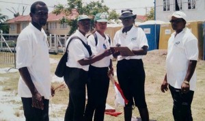  Munroe (far left) officiating at Nationals Schools’ Championships, Eve Leary Ground, 2002.