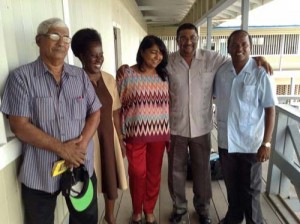 Mr. Dwhaj with Headmistress of Berbice Educational Institute Ms. Willa Batson (second from left) after donating several books in 2014. Also in picture is his daughter, Maureen, Region 6 Chairman, Mr. D. Armogan and teacher, Basodeo Utam.