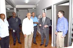President Donald Ramotar, Natural Resources and the Environment Minister, Robert Persaud and ExxonMobil’s Country Manager, Jeff Simon during a tour of the company’s head office at New Market Street yesterday.