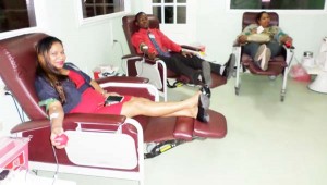 Giftland employees donating blood yesterday at the National Blood Bank.