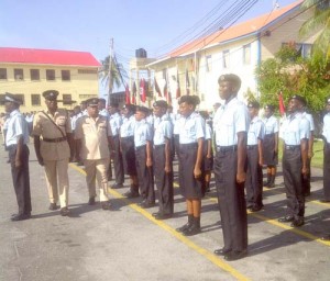 Asst. Comm. Balram Persaud inspects a Guard of Honour of newly appointed ranks of the Guyana Police Force.
