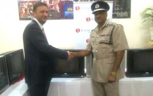  Commissioner of Police Seelall Persaud and the hotel’s General Manager, Ugur Turetgen during the handing over ceremony.