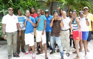 The boxers pause for a photo op moments after arriving in French Guiana yesterday afternoon.