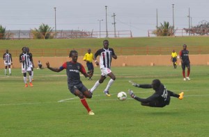 Alpha United’s Captain Gregory Richardson is denied by a robotic save from Inter Moengotapoe’s goalkeeper, Huiswoud Obrendo. (Franklin Wilson photo) 