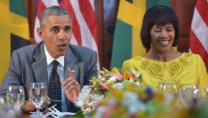 US President Barack Obama (L) speaks during a bilateral meeting with Jamaica’s Prime Minister Portia Simpson Miller at Jamaica House yesterday in Kingston (AFP Photo/Mandel Ngan)