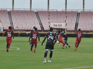 Battle for possession between Central FC and Inter Moengotapoe .