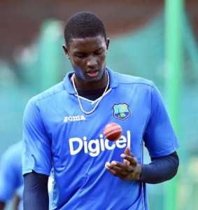 Jason Holder heads back to his mark during net practice, Grenada, April 20, 2015 (Getty Images)