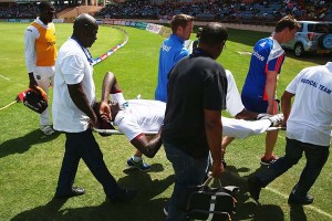 Jason Holder was stretched off the field with an ankle injury, West Indies v England, 2nd Test, St George’s, 5th day, April 25, 2015 ©Getty Images