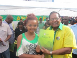 APNU+AFC Prime Ministerial candidate hands out a copy of the coalition’s Manifesto.