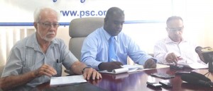 PSC Chairman, Ramesh Persaud (centre) delivering his remarks during the press conference yesterday.