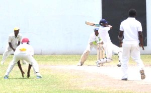 Renaldo Mohamed pulls Harry for four during his 62-run stand with Timothy McCalmont at DCC yesterday.