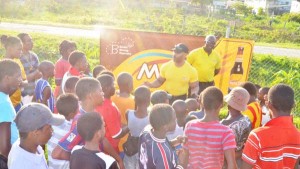 Hugh Ross and Clayton McKenzie interact with youths of Agricola during the Outreach Exercise.