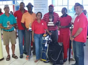 In picture the winners and 3 Scotiabank representatives. L to R: I. Gouveia, Country Manager – R. Smith, Dr P. London, J. Cipriani, M. Bhagwandin, S. Webster, P. Prashad (partly hidden) and P. Budhu.