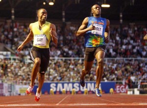 U.S. sprinter Tyson Gay, left, beats Jamaican Usain Bolt in the 100m race during the Diamond League Athletics meeting in Stockholm, Sweden, Friday, Aug. 6, 2010. (Photo/Michael Probst)