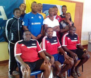 The officials (front row) and participants take time out for a photo following the programme.