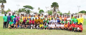  Participants of the GFF/CONCACAF Women’s Day activity pose for a photo yesterday at the Tucville ground.   