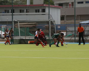 Checkers striker Patrice Padmore is challenged by GCC’s Tiffany Solomon and Ulrica Sutherland.