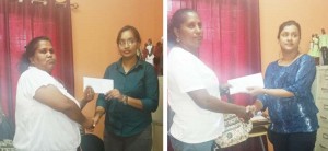 Farida Prashad and Poonadai Khuball receiving their donations from members of the IAC