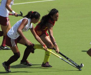 GCC Captain Sonia Jardine (right) fights for possession of the ball against an opponent in a previous match.