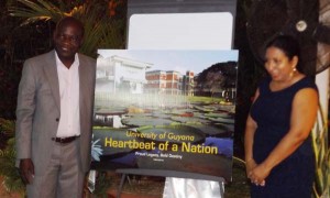 Vice Chancellor of UG, Jacob Opadeyi (left) and Dr Paloma Mohamed (right), unveiling the cover of Heartbeat of a Nation.