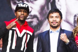 Undefeated WBC/WBA welterweight champion Floyd Mayweather Jr. of the U.S. and WBO welterweight champion Manny Pacquiao of the Philippines pose during a final news conference at the MGM Grand Arena in Las Vegas, April 29, 2015. (Reuters/Las Vegas Sun/Steve Marcus) 