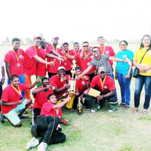 We are the champs! Members of the victorious Wakenaam team display their accolades with representatives of the sponsors. 