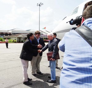 President Carter, Haroon Shafiq (shaking hands with Carter) and American Embassy Chargé d’ Affaires Bryan Hunt