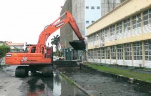 BK International machinery clearing out canals near the National Museum 