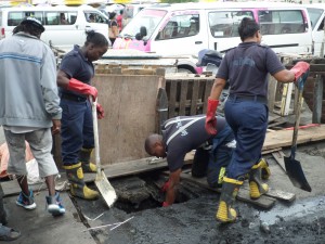 Firemen cleaning up the Stabroek area