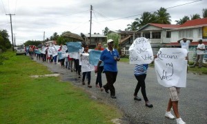Protestors in front of GECOM’s Essequibo office.