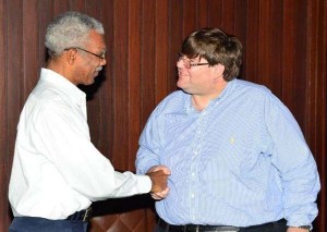 President David Granger welcoming US Charge d’Affaires, Bryan Hunt, during a courtesy call at the Presidential complex yesterday.