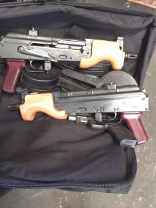 Assault rifles, pistols found in crate 