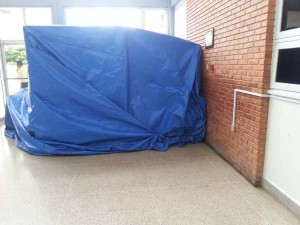  The Hybrid machine covered with a tarpaulin on the ground floor of the GPHC