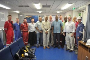 President David Granger, Alliance for Change Executive Member Rafael Trotman and Minister of State within the Ministry of the Presidency, Joseph Harmon with the crew of the ExxonMobil drill ship.