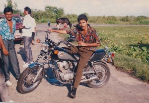 Dr. Narine in his younger days on his motorcycle.
