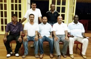 In picture, (from left) standing - R. Persaud, D. Bissessar; (sitting from left) – C. Deo, H. Tewari, D. Mohamad, S. Ramroop, G. Griffith.