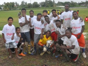 Goal Keeper Devon Forde (with ball) led 8th of May to victory against Aurora 2-1 on penalty Kicks.