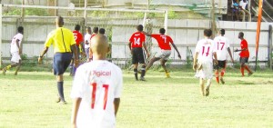 Friendship Secondary (in red) scores in their clash against Xenon Academy yesterday at the Grove ground.
