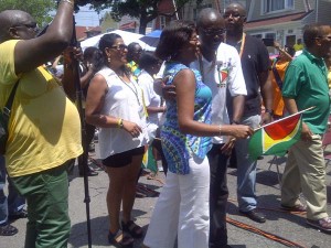  Minister of Tourism Cathy Hughes is greeted by an enthusiastic New York based Guyanese at the Brooklyn rally.        