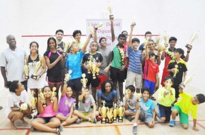 Squash Champs show off their trophies yesterday. 