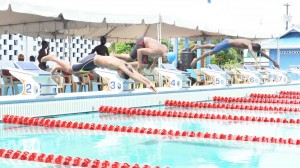 Action in the 13-14 Boys 100 meters freestyle race.