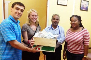 From left: Peace Corps Volunteer attached to FCSF, Ben Armuth,  Peace Corps Volunteer attached to Linden Hospital Complex Rachel Ivancie, CEO (ag) Dr Steve Mark and PRO Linden Hospital Complex Reycia Nedd.