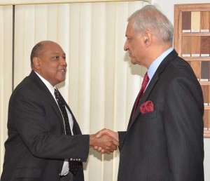 Minister of Governance, Raphael Trotman, with Secretary General of the Commonwealth, Kamalesh Sharma.