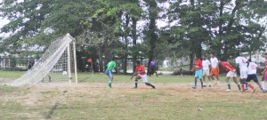Camille Institute’s goalkeeper Kenford Evans is beaten by Jamin Benjamin (#10) of Diamond Secondary, his first goal of three. 