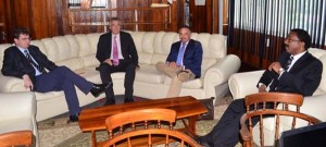Attorney General, Basil Williams (far right) during meeting with UK, High Commissioner, Gregory Quinn (far left0 and other UK officials.