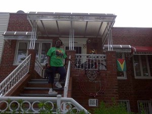  Denise Beaton is making sure that everyone knows she is one patriotic Guyanese with a Guyana flag permanently attached to her house in Brooklyn.
